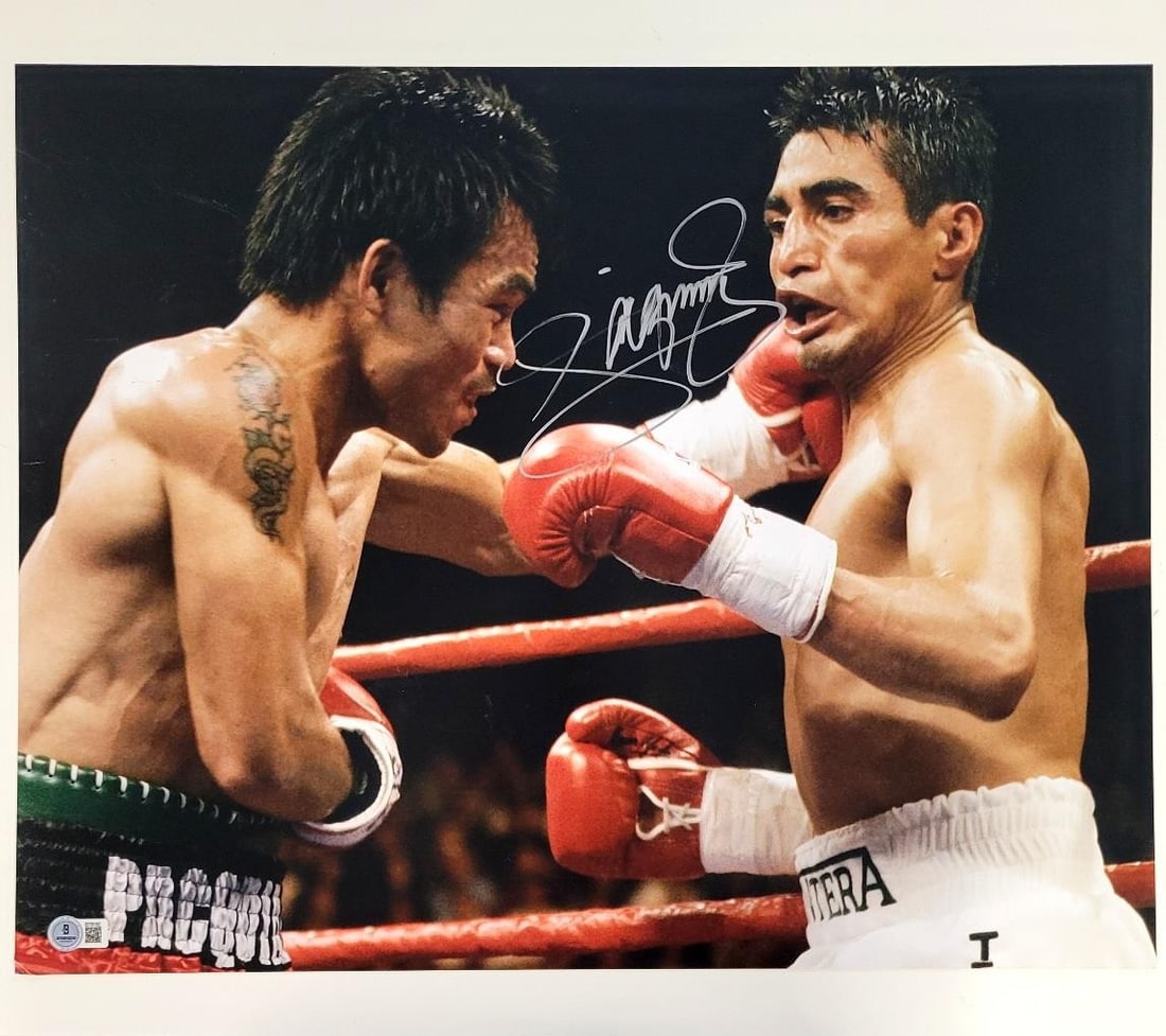 Manny Pacquiao Signed 16x20 Boxing Photo Beckett Authenticated: Manny Pacquiao Signed 16x20 Boxing Photo Beckett Authenticated This is a signed 16x20 photograph of boxing legend Manny Pacquiao. Authenticated by Beckett Authentication Services (BAS), this original
