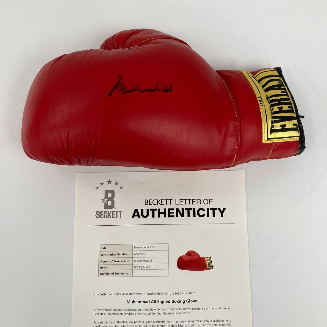 Muhammad Ali Signed Everlast Boxing Glove with Beckett COA: Muhammad Ali Signed Everlast Boxing Glove with Beckett COA This is a Muhammad Ali signed Everlast boxing glove, a remarkable collectible for any boxing fan. The glove features an authentic signature f