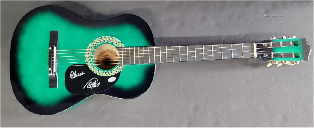 Cheech & Chong Signed Acoustic Guitar JSA Authenticated: Cheech & Chong Signed Acoustic Guitar JSA Authenticated This is an authentic Cheech & Chong autographed acoustic guitar, personally signed by the legendary duo. The guitar comes with authentication fr