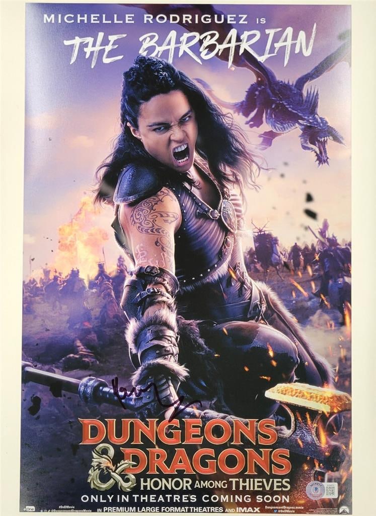 Michelle Rodriguez Autographed Dungeons & Dragons 11x17 Photo Beckett Authenticated: Michelle Rodriguez Autographed Dungeons & Dragons 11x17 Photo Beckett Authenticated This original 11x17 photograph features a stunning image from the movie "Dungeons & Dragons: Honor Among Thieves" an