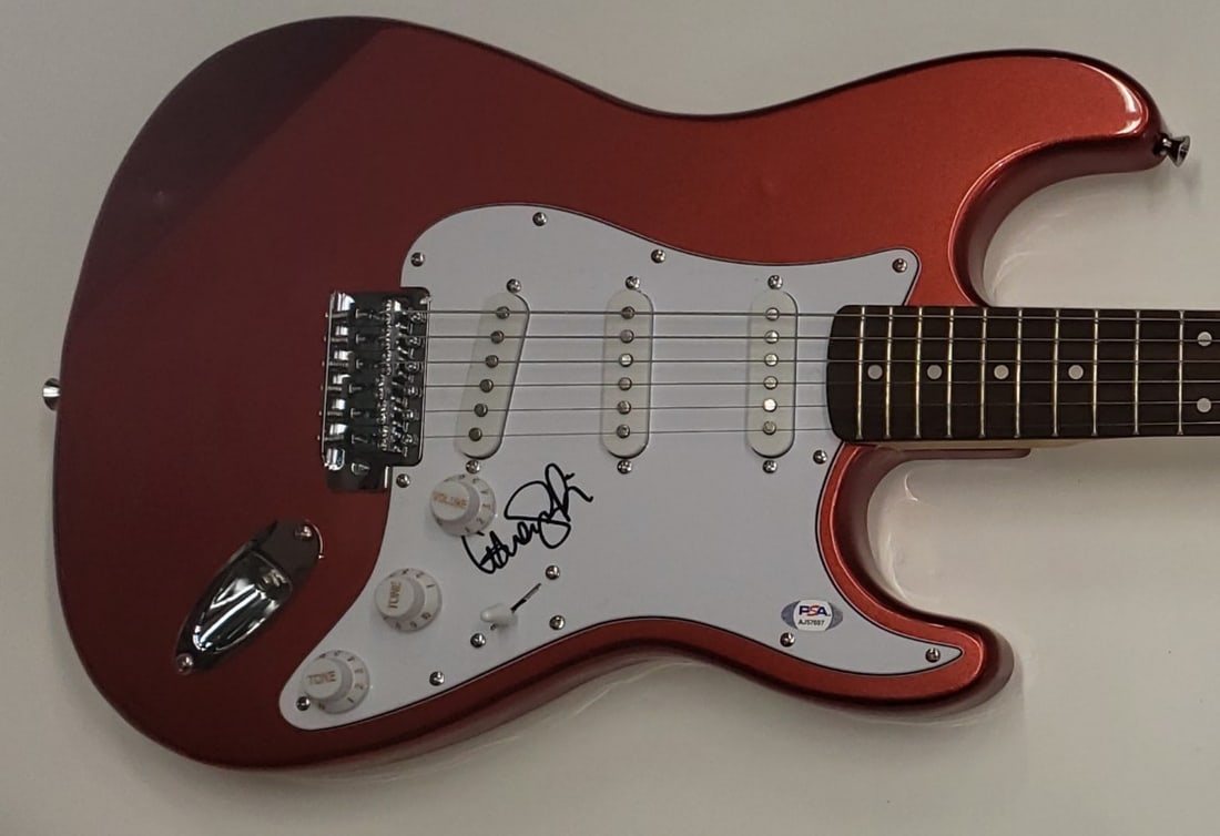 Ashlee Simpson Autographed Electric Guitar PSA Certified Signature: Ashlee Simpson Autographed Electric Guitar PSA Certified Signature This Ashlee Simpson autographed electric guitar is a must-have for any fan of the pop superstar. The guitar is authenticated by Profe