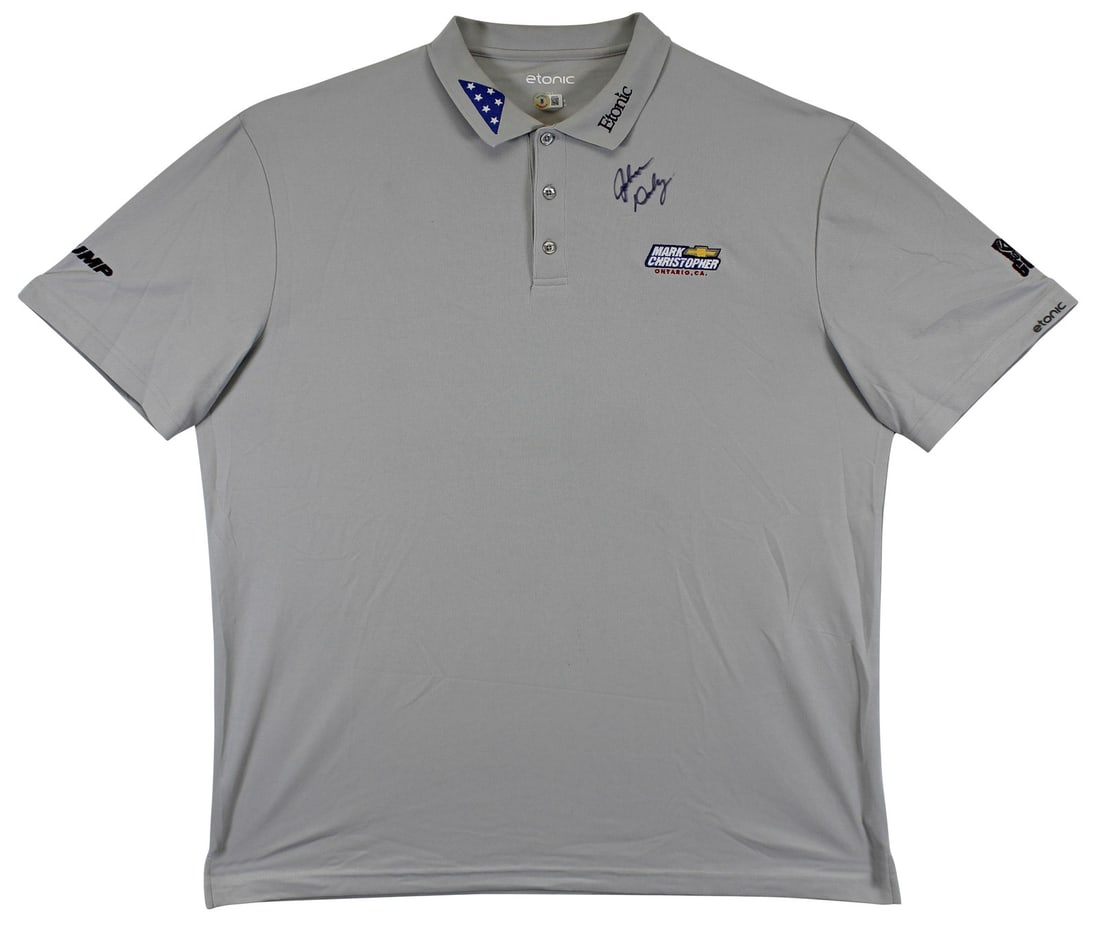 John Daly Signed Match Worn Grey Polo Shirt Beckett Authenticated: John Daly Signed Match Worn Grey Polo Shirt Beckett Authenticated This authentic match-worn grey polo shirt has been personally signed by professional golfer John Daly. The shirt is an Etonic Mark Chr