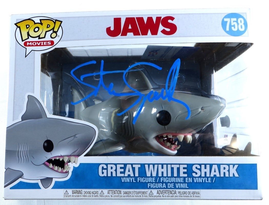 Steven Spielberg Signed Funko POP Jaws Great White Shark PSA Certified: Steven Spielberg Signed Funko POP Jaws Great White Shark PSA Certified This is a signed Funko POP! figure of the iconic Great White Shark from the classic film Jaws, autographed by legendary filmmaker