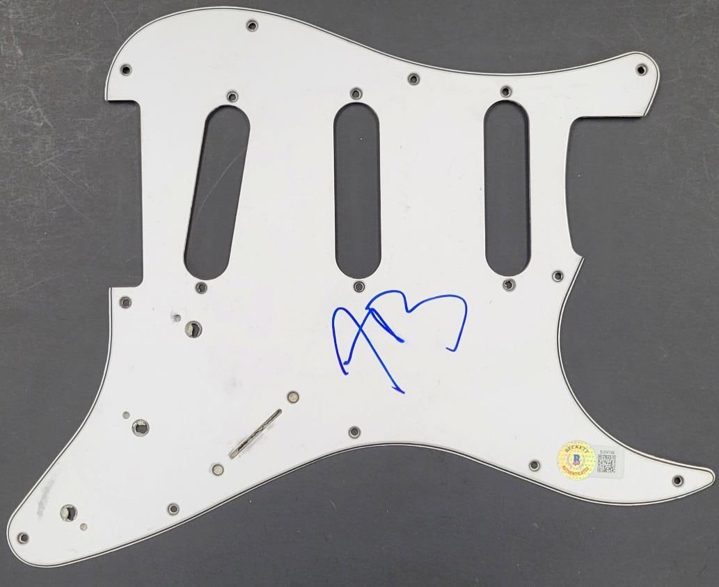 Austin Butler Signed Elvis Electric Guitar Pickguard Beckett Authenticated: Austin Butler Signed Elvis Electric Guitar Pickguard Beckett Authenticated This is an authentic, pre-owned Electric Guitar Pickguard signed by Austin Butler, known for his portrayal of Elvis in the mo