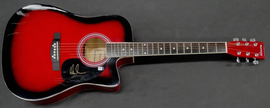 David Draiman Autographed Full Size Guitar Disturbed GAI Certified: David Draiman Autographed Full Size Guitar Disturbed GAI Certified This is an authentic, full-size guitar hand-signed by David Draiman, the lead vocalist of the band Disturbed. The autograph has been