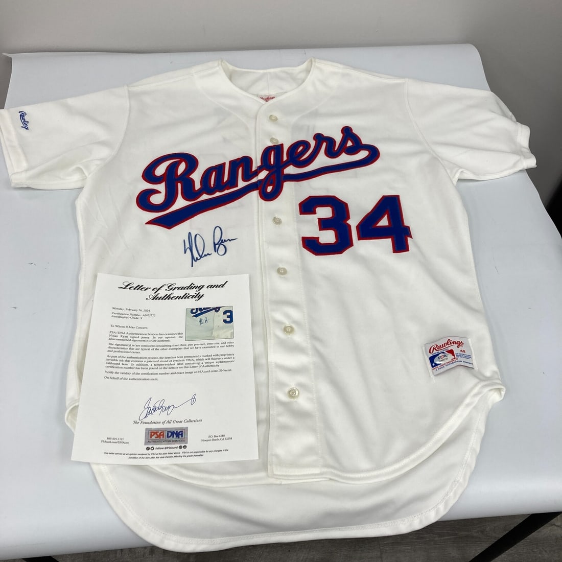Nolan Ryan Signed Texas Rangers Game Jersey PSA MINT 9: Nolan Ryan Signed Texas Rangers Game Jersey PSA MINT 9 Own a piece of baseball history with this authentic game model jersey signed by legendary pitcher Nolan Ryan. This Texas Rangers jersey showcases