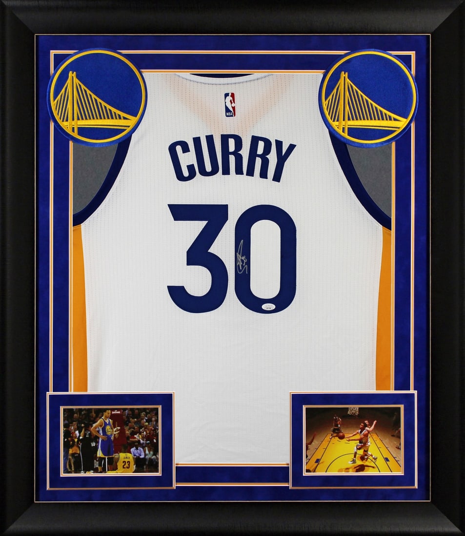 Stephen Curry Signed Framed The Bay Jersey JSA Certified Warriors: Stephen Curry Signed Framed The Bay Jersey JSA Certified Warriors Celebrate your love for basketball with this authentic signed white Adidas The Bay framed jersey of Stephen Curry, a superstar of the