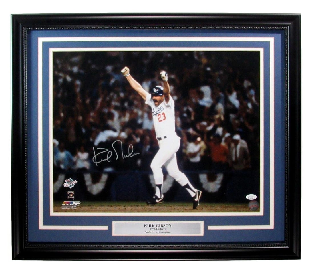 Kirk Gibson Signed Framed 16x20 Photo 1988 World Series JSA Authenticated: Kirk Gibson Signed Framed 16x20 Photo 1988 World Series JSA Authenticated Celebrate a historic moment in baseball with this Kirk Gibson signed 16x20 photo from Game 1 of the 1988 World Series. This or