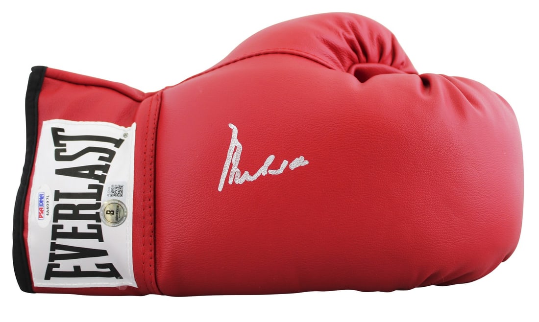 Muhammad Ali Signed Red Everlast Boxing Glove Beckett COA: Muhammad Ali Signed Red Everlast Boxing Glove Beckett COA This authentic red Everlast boxing glove has been personally signed by the legendary boxer Muhammad Ali. The item is certified as original and