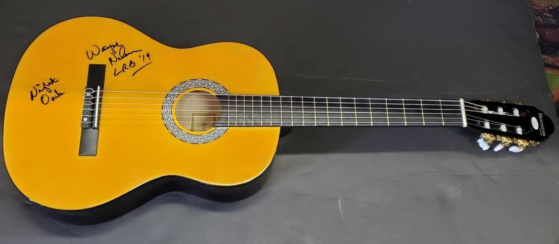 Wayne Nelson Signed Guitar Little River Band JSA Authenticated: Wayne Nelson Signed Guitar Little River Band JSA Authenticated This is an original guitar autographed by Wayne Nelson, renowned member of the Little River Band. The autograph has been authenticated by