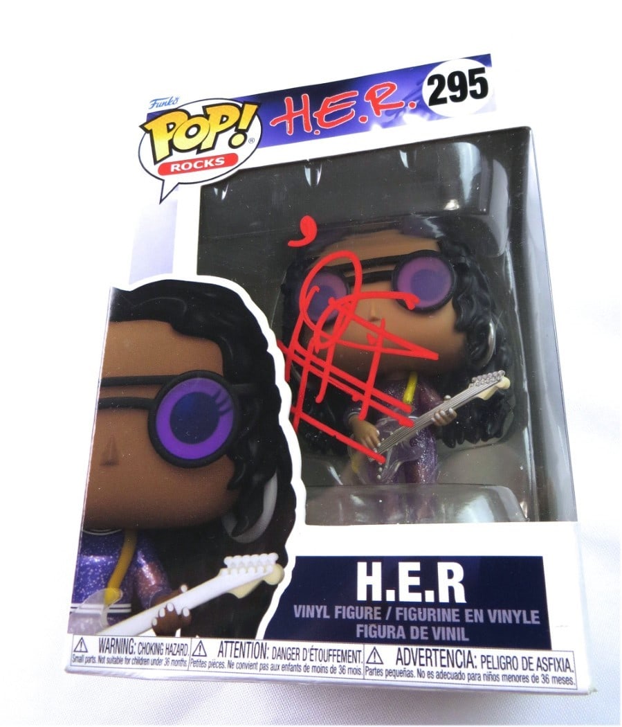 H.E.R. Autographed Funko POP! JSA Certified Music Collectible: H.E.R. Autographed Funko POP! JSA Certified Music Collectible This is a pre-owned Funko POP! figure of the renowned singer-songwriter H.E.R., featuring her signature. The autograph is authenticated by
