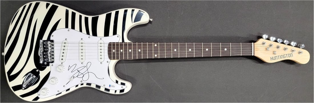 Mod Sun Autographed Electric Guitar with Beckett Authentication: Mod Sun Autographed Electric Guitar with Beckett Authentication This is an original electric guitar autographed by Mod Sun, a well-known singer-songwriter. The autograph has been authenticated by Beck