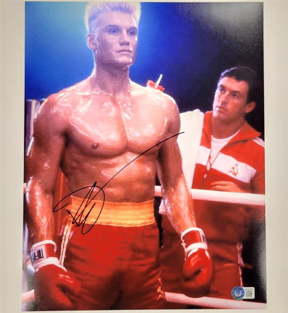 Dolph Lundgren Signed Ivan Drago Rocky IV 11x14 Photo Beckett Authenticated: Dolph Lundgren Signed Ivan Drago Rocky IV 11x14 Photo Beckett Authenticated This is an original 11x14 photograph featuring Dolph Lundgren as Drago from the movie Rocky IV. The photograph is authentica