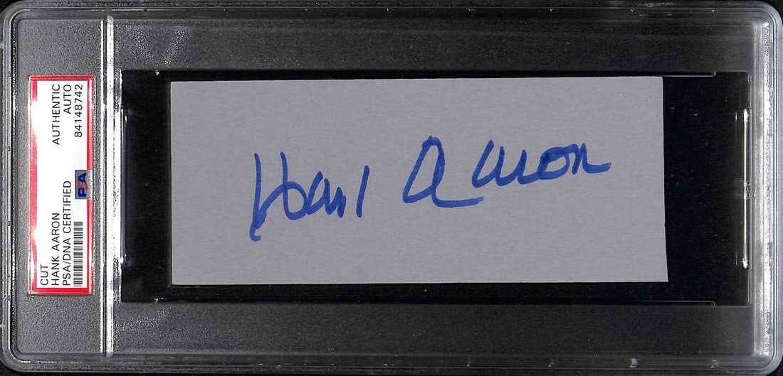 Hank Aaron Autographed 6x2.5 Cut Card PSA/DNA Atlanta Braves: Hank Aaron Autographed 6x2.5 Cut Card PSA/DNA Atlanta Braves This is a Hank Aaron Hall of Fame signed/autographed 6x2.5 cut card featuring the Atlanta Braves. The card is an original and has been auth