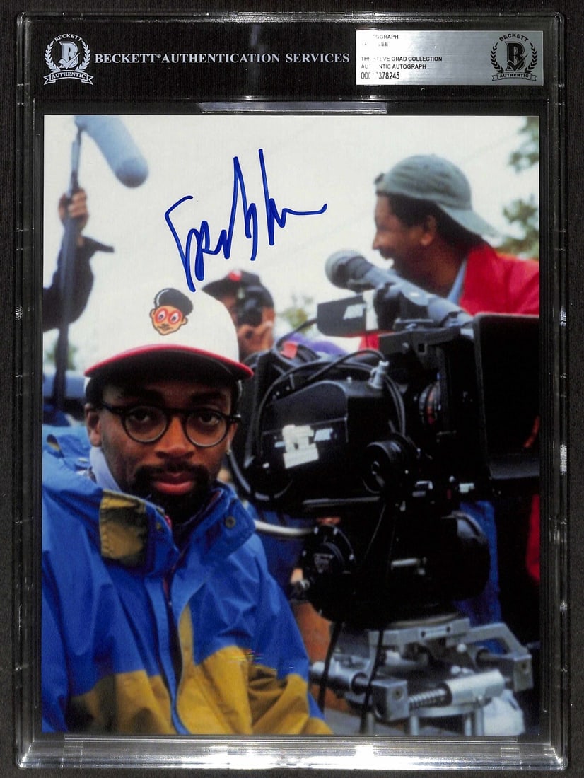Spike Lee Signed 8x10 Photograph Beckett Authenticated: Spike Lee Signed 8x10 Photograph Beckett Authenticated This autographed 8x10 photograph features acclaimed actor and director Spike Lee, capturing a moment from his film "Crooklyn." The signature is r