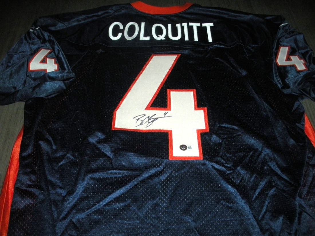 Britton Colquitt Signed Denver Broncos Nike Jersey with COA: Britton Colquitt Signed Denver Broncos Nike Jersey with COA This official licensed Nike jersey is a must-have for any Denver Broncos fan. Signed by Britton Colquitt, this jersey showcases your support