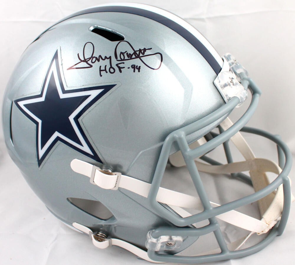 Tony Dorsett Autographed Dallas Cowboys Full Size Helmet Beckett Holo: Tony Dorsett Autographed Dallas Cowboys Full Size Helmet Beckett Holo This authentic full-size Dallas Cowboys speed helmet is autographed by NFL legend Tony Dorsett. The helmet features a sleek design