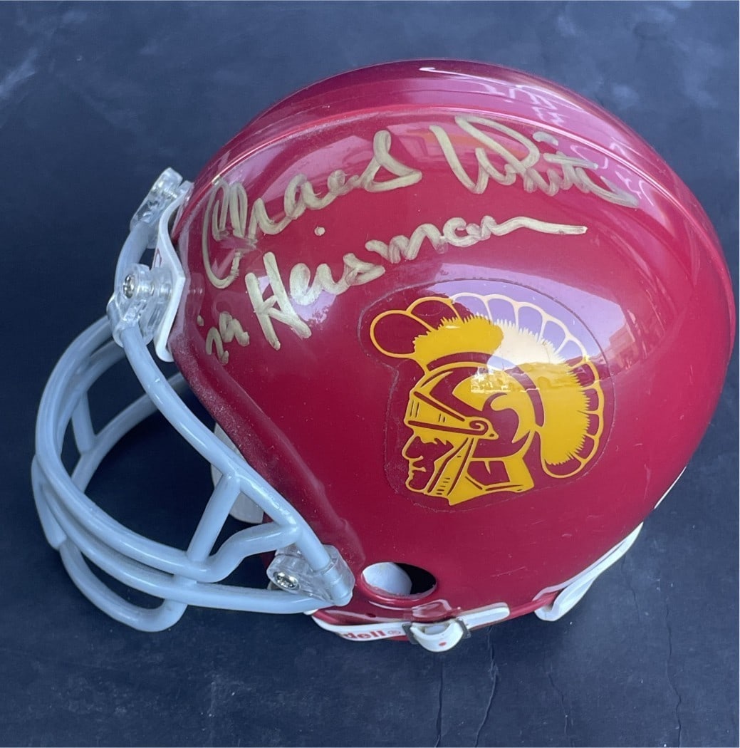 Charles White USC Mini Helmet Autographed Heisman 79 JSA Certified: Charles White USC Mini Helmet Autographed Heisman 79 JSA Certified Celebrate USC Trojans football history with this Charles White autographed mini helmet. This collectible piece features the signature