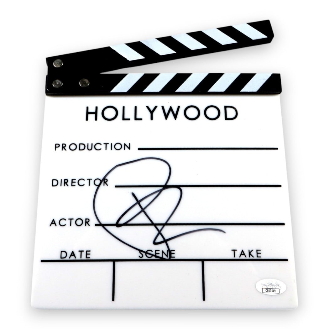 Pamela Anderson Signed Movie Clapper Authenticated by JSA: Pamela Anderson Signed Movie Clapper Authenticated by JSA This is an authentic movie clapper signed by Pamela Anderson, known for her iconic roles in 'Baywatch' and 'Barb Wire.' The signature has been