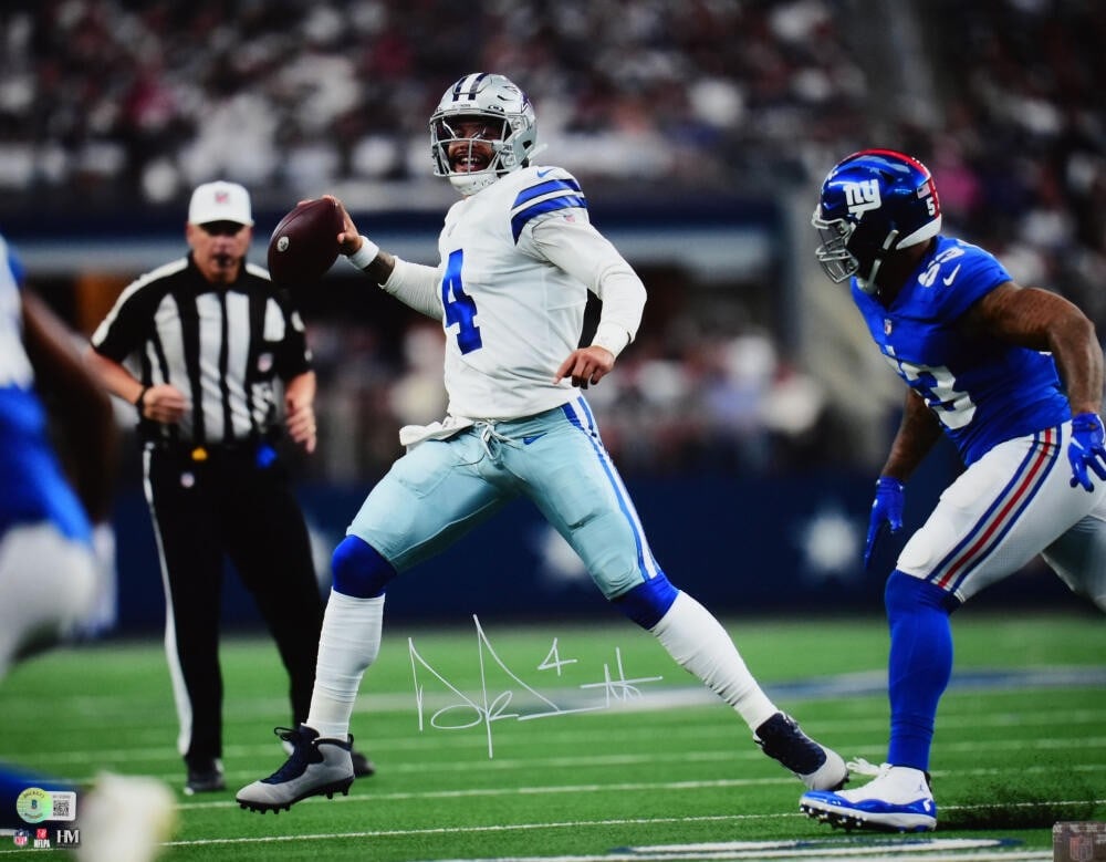 Dak Prescott Autographed 16x20 Cowboys Photo Beckett Authenticated: Dak Prescott Autographed 16x20 Cowboys Photo Beckett Authenticated This original 16x20 photo features Dak Prescott, the star quarterback of the Dallas Cowboys, in action against the New York Giants. T
