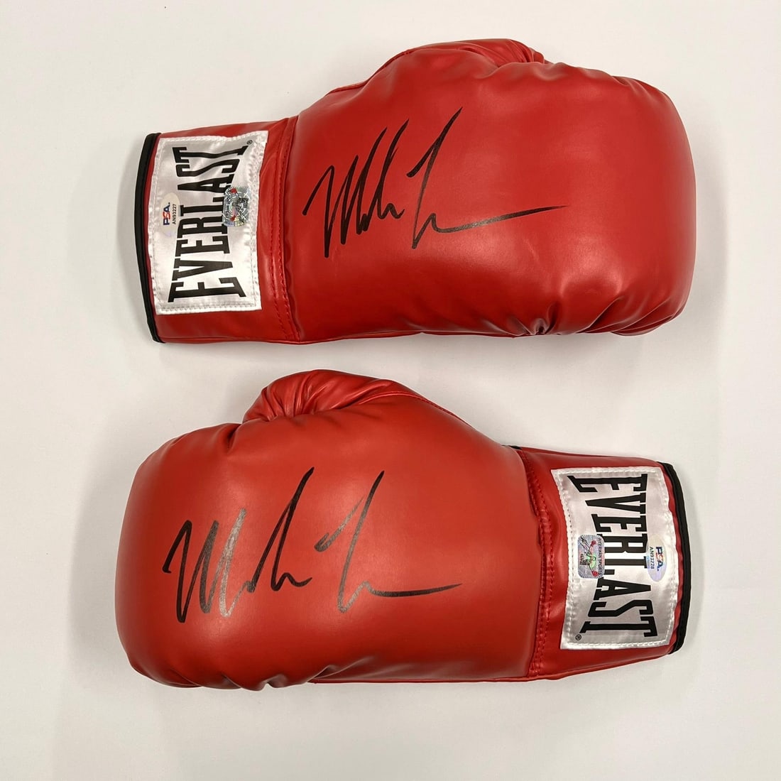 Mike Tyson Signed Boxing Gloves with PSA/DNA Authentication: Mike Tyson Signed Boxing Gloves with PSA/DNA Authentication This is a pair of original boxing gloves signed by the legendary Mike Tyson, a must-have for any boxing fan or memorabilia collector. The au