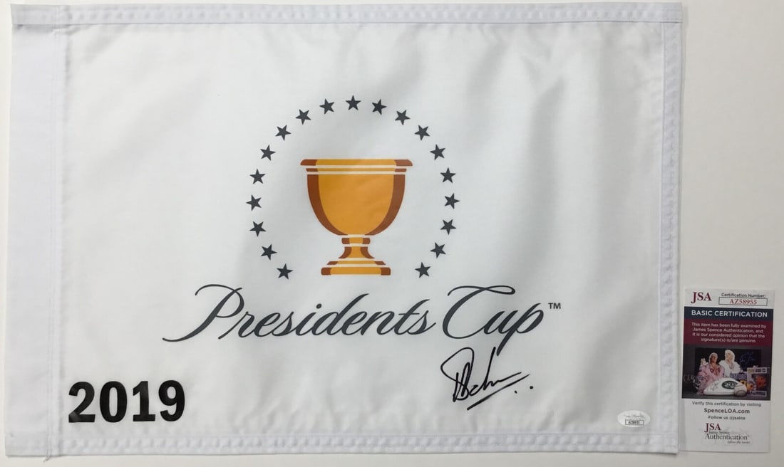 Adam Hadwin Signed 2019 President's Cup Pin Flag JSA Authenticated: Adam Hadwin Signed 2019 President's Cup Pin Flag JSA Authenticated Celebrate the excitement of golf with this official The President's Cup 2019 pin flag, signed by PGA star Adam Hadwin. The signature