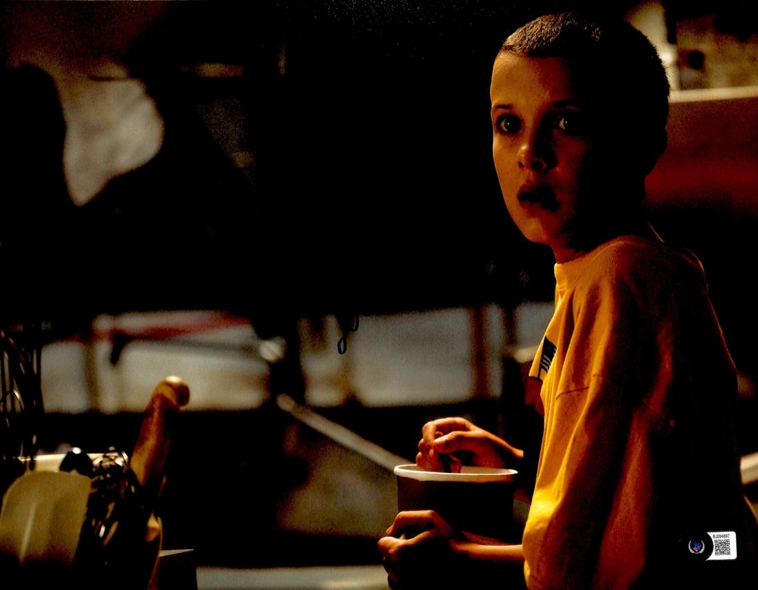 Millie Bobby Brown Signed 11x14 Stranger Things Photo Beckett Certified: Millie Bobby Brown Signed 11x14 Stranger Things Photo Beckett Certified This stunning 11x14 photograph features Millie Bobby Brown, known for her iconic role as "Eleven" in the popular TV series Stran