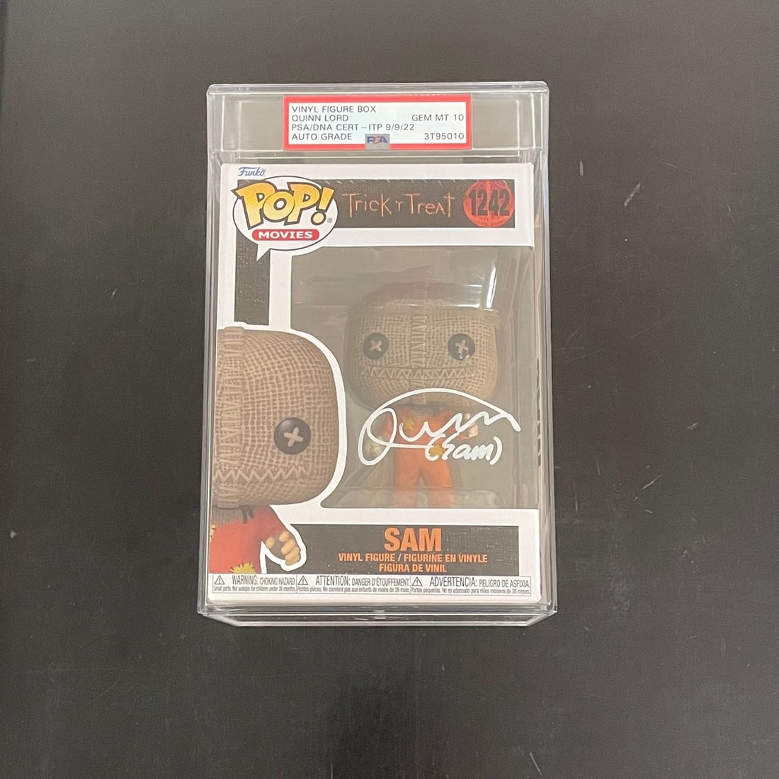 Quinn Lord Signed Funko Pop Sam Trick or Treat PSA/DNA AUTO 10: Quinn Lord Signed Funko Pop Sam Trick or Treat PSA/DNA AUTO 10 This Funko Pop #1242 features the character Sam from 'Trick or Treat' and is signed by Quinn Lord. The autograph has been authenticated b