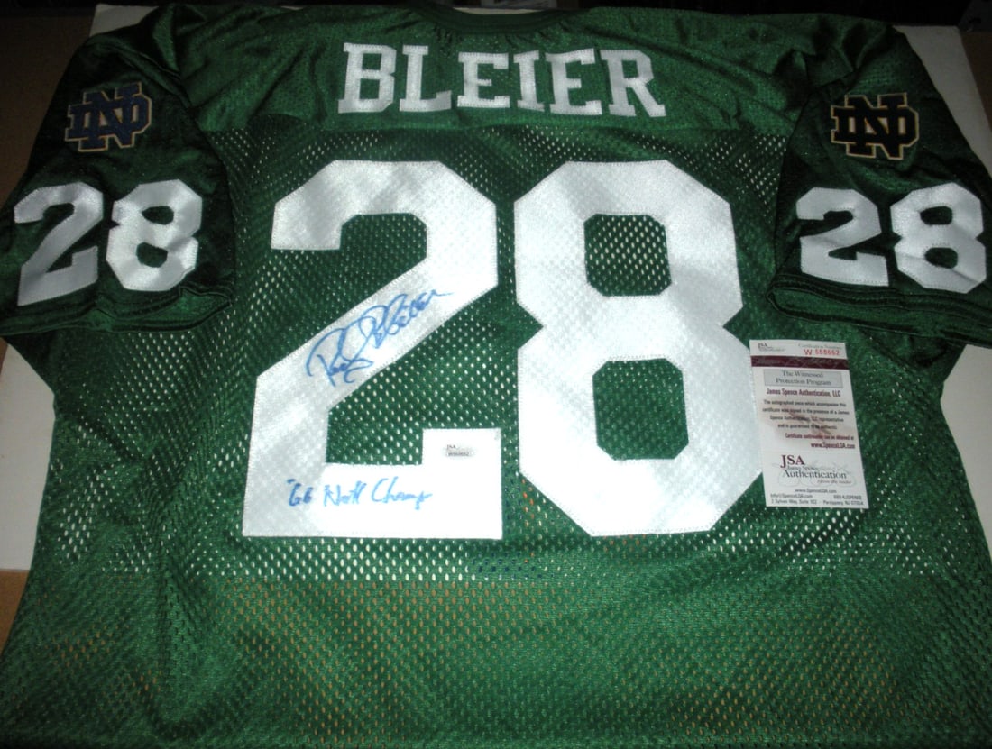 Rocky Bleier Signed Notre Dame Irish Wilson Jersey with JSA COA: Rocky Bleier Signed Notre Dame Irish Wilson Jersey with JSA COA This is an official licensed Wilson jersey signed by Rocky Bleier, the former NFL player and Notre Dame Irish standout. This collectible