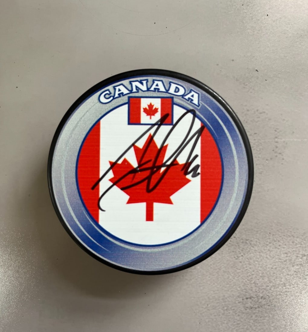 Jonathan Toews Signed Team Canada NHL Logo Puck JSA Authenticated (1 of 2)