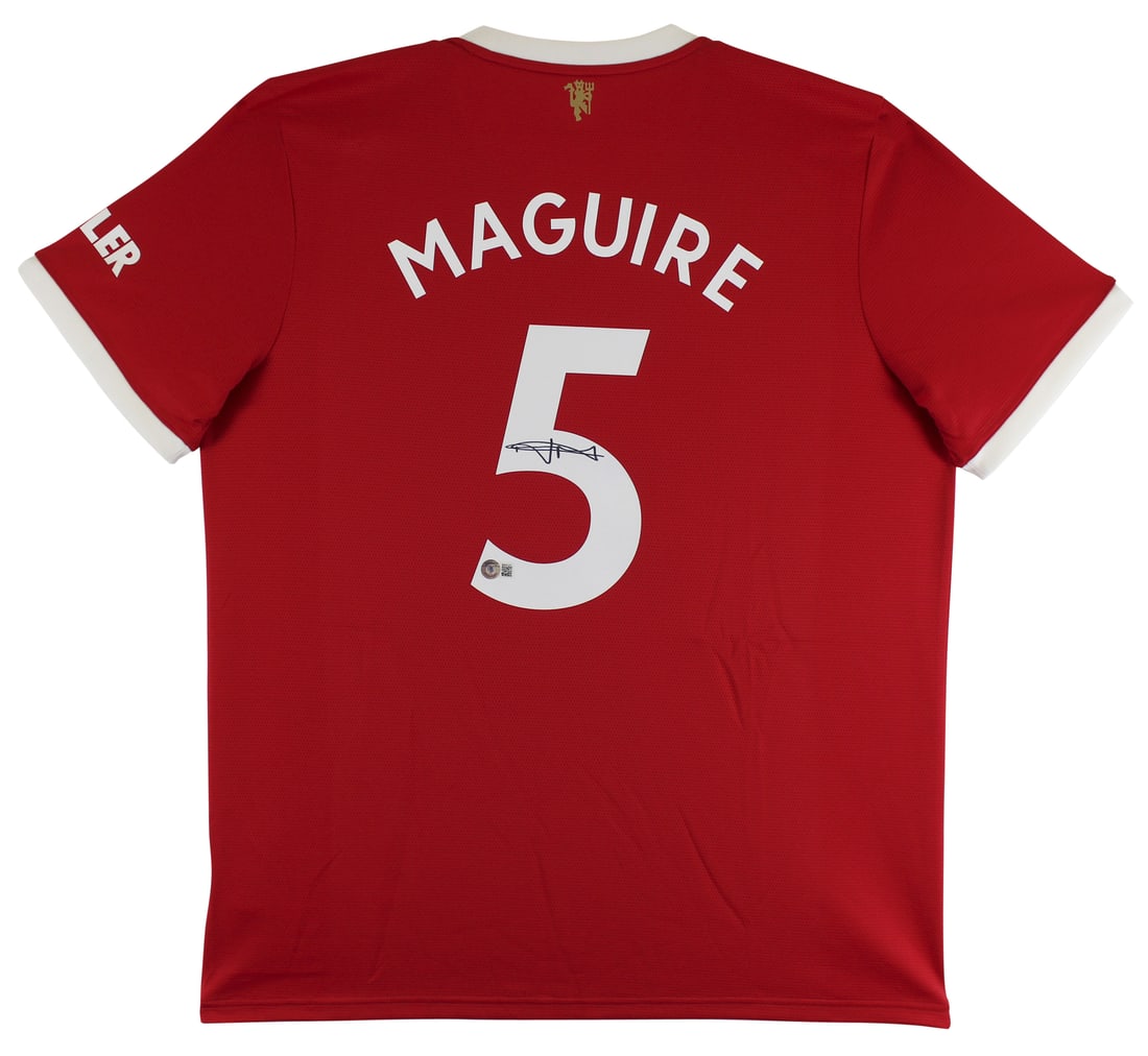 Harry Maguire Signed Manchester United Red Adidas Jersey Beckett COA: Harry Maguire Signed Manchester United Red Adidas Jersey Beckett COA This authentic red Adidas jersey is personally signed by Harry Maguire, a key player for the Manchester United Football Club. The j