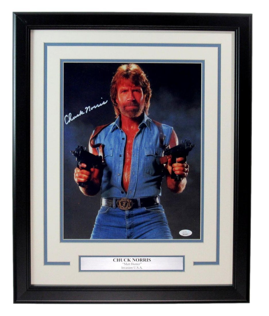 Chuck Norris Matt Hunter Signed Photo Framed JSA Authenticated 11x14: Chuck Norris Matt Hunter Signed Photo Framed JSA Authenticated 11x14 Capture a piece of cinematic history with this signed photograph of Chuck Norris as "Matt Hunter" from "Invasion U.S.A." This origi