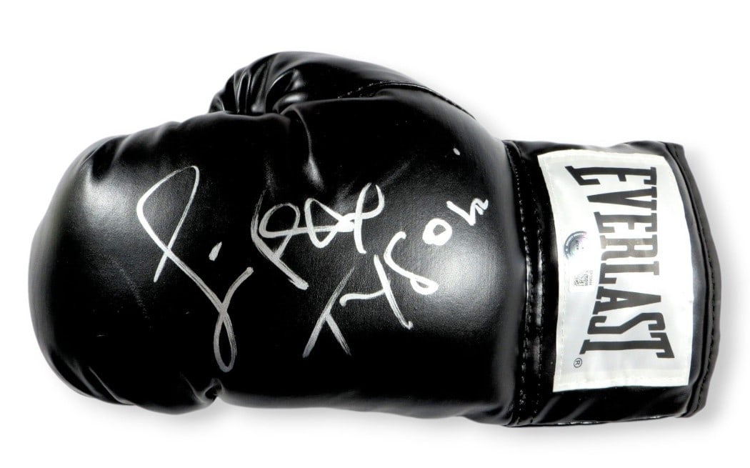 Jamie Foxx Signed Boxing Glove Inscribed Tyson Beckett Authenticated: Jamie Foxx Signed Boxing Glove Inscribed Tyson Beckett Authenticated This is an authentic boxing glove signed by Jamie Foxx, featuring the inscription "Tyson". The autograph has been verified by Becke