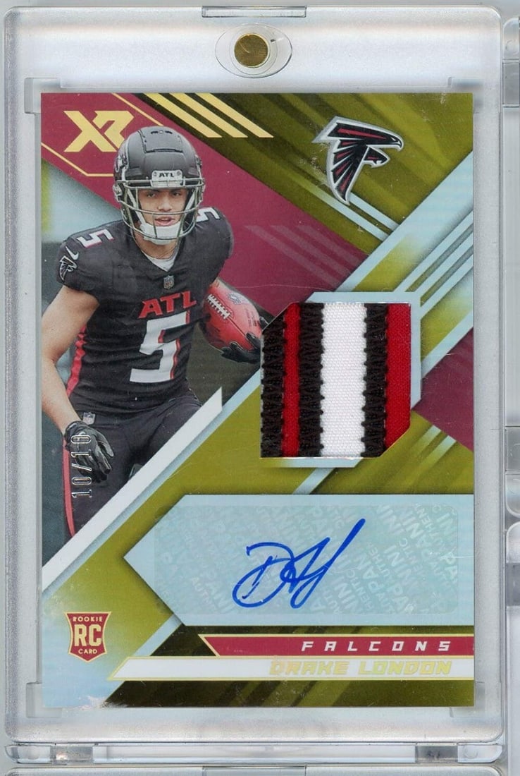 2022 Panini XR Gold Drake London 10/10 RPA Autographed Rookie Card: 2022 Panini XR Gold Drake London 10/10 RPA Autographed Rookie Card This is a 2022 Panini XR Gold Drake London #RSADL 10/10 RPA Auto Rookie RC Football Card, featuring the talented wide receiver of the
