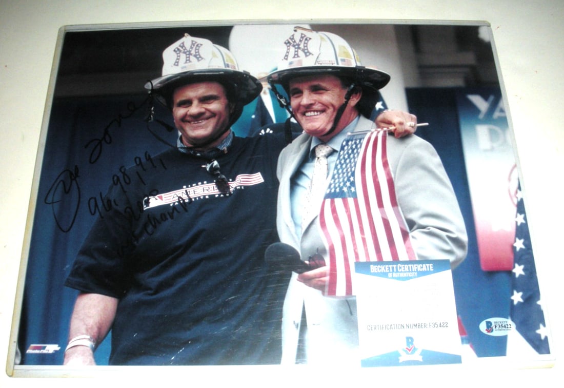 Joe Torre Signed 11x14 Yankees World Series Photo Beckett COA: Joe Torre Signed 11x14 Yankees World Series Photo Beckett COA This is an original signed 11x14 photograph of Joe Torre, the legendary manager of the New York Yankees, commemorating the team's World Se
