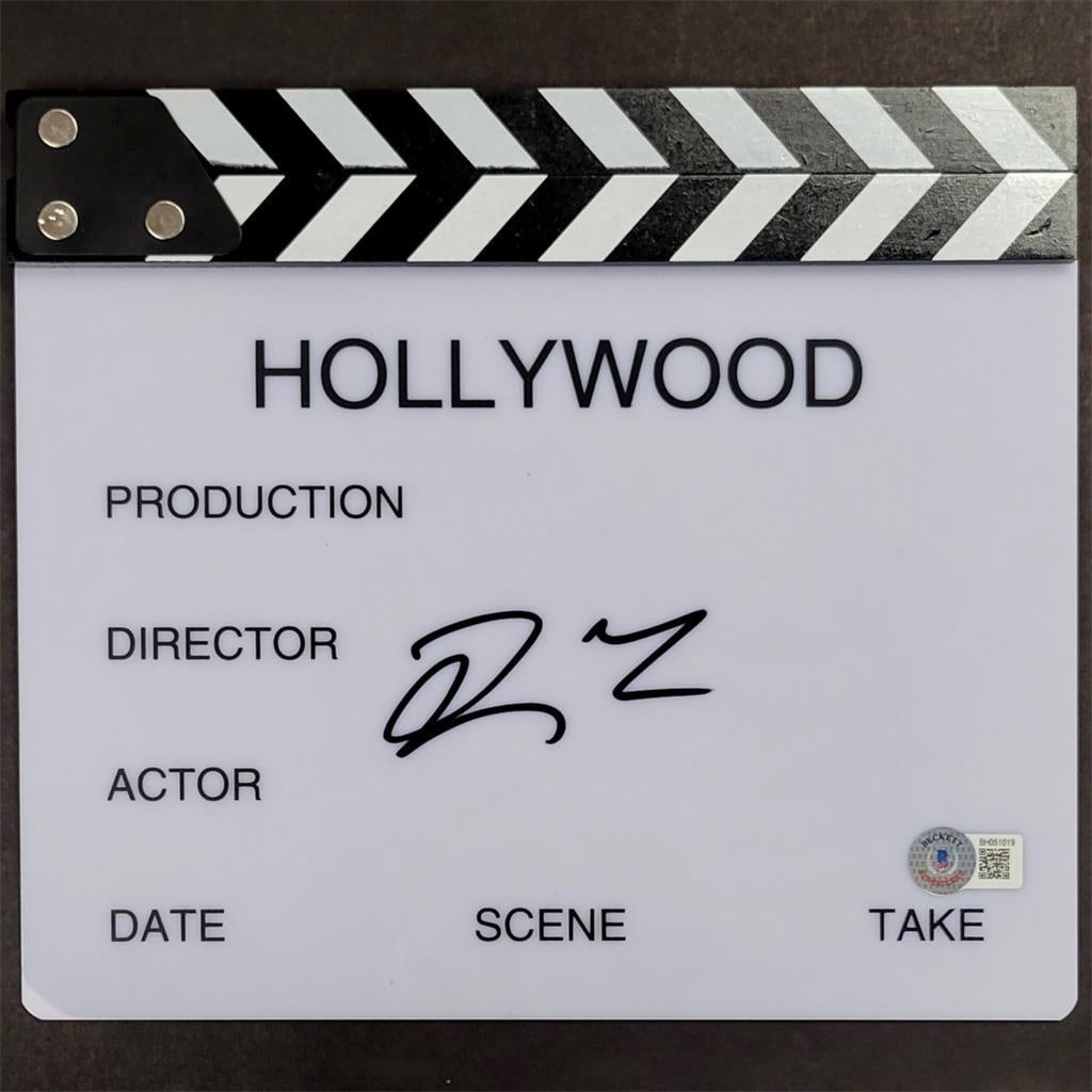Quentin Tarantino Signed Pulp Fiction Movie Clap Board Beckett Authenticated: Quentin Tarantino Signed Pulp Fiction Movie Clap Board Beckett Authenticated This original director's movie clap board, signed by acclaimed filmmaker Quentin Tarantino, is a must-have for any movie en
