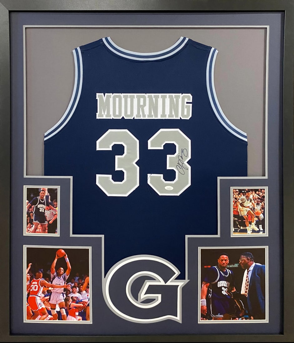Alonzo Mourning Signed Framed Georgetown Jersey JSA Authenticated: Alonzo Mourning Signed Framed Georgetown Jersey JSA Authenticated This is a pre-owned autographed Alonzo Mourning framed jersey, featuring exceptional detail in the framing and logo. The jersey is aut