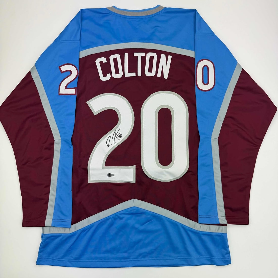 Ross Colton Signed Colorado Avalanche Hockey Jersey Beckett COA: Ross Colton Signed Colorado Avalanche Hockey Jersey Beckett COA This signed Ross Colton Colorado Avalanche maroon hockey jersey is a unique collectible, authenticated by Beckett Grading Services. The