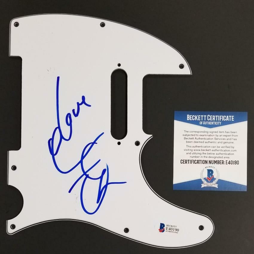 COMMON Signed Guitar Pickguard with Beckett BAS COA: COMMON Signed Guitar Pickguard with Beckett BAS COA This is an authentic guitar pickguard autographed by rapper Common. The item is original and has been pre-owned, showcasing a unique signature that