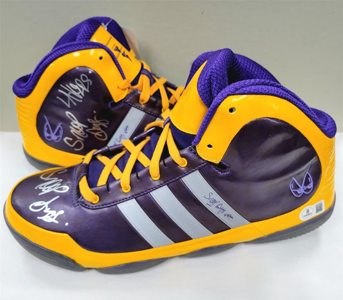 Snoop Dogg Autographed Adidas adiPure Lakers Shoes Beckett Authenticated: Snoop Dogg Autographed Adidas adiPure Lakers Shoes Beckett Authenticated These original Adidas adiPure shoes feature a striking signature from Snoop Dogg, adding a unique touch to any collection. Auth