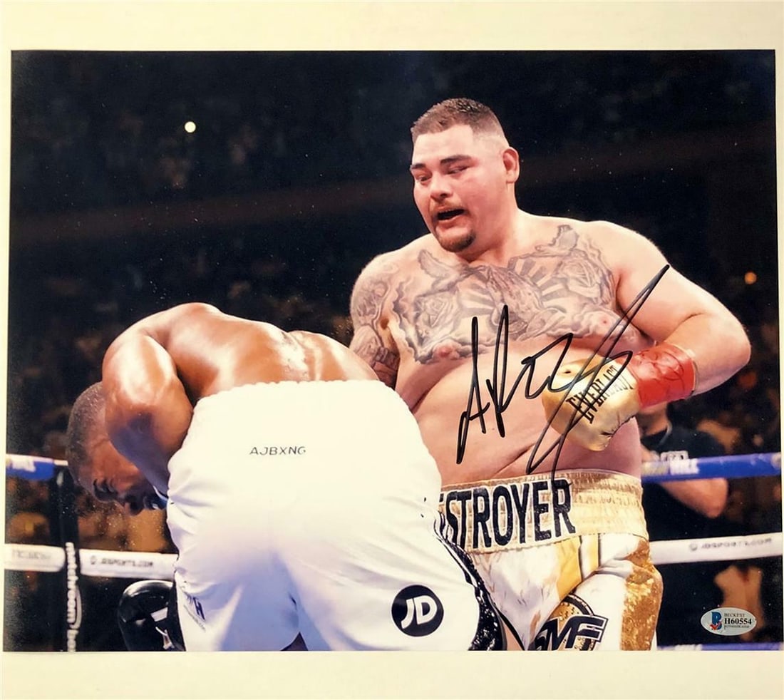 Andy Ruiz Jr Signed 11x14 Photo vs Anthony Joshua Beckett Authenticated: Andy Ruiz Jr Signed 11x14 Photo vs Anthony Joshua Beckett Authenticated Celebrate the thrilling boxing match between Andy Ruiz Jr. and Anthony Joshua with this autographed 11x14 photo. This original p