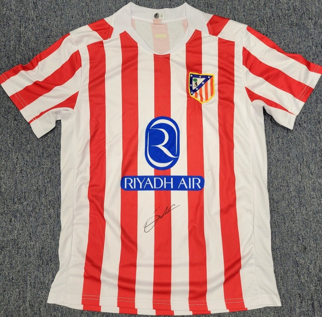 Antoine Griezmann Autographed Atletico Madrid Jersey Beckett BAS: Antoine Griezmann Autographed Atletico Madrid Jersey Beckett BAS Own a piece of soccer history with this original signed jersey from Antoine Griezmann, a star player for Atletico Madrid. This authenti