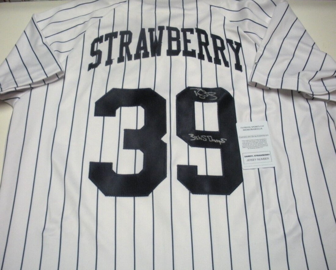 Darryl Strawberry Signed New York Yankees Majestic Jersey with COA: Darryl Strawberry Signed New York Yankees Majestic Jersey with COA This official licensed Majestic jersey features the iconic New York Yankees design and is personally signed by the legendary Darryl S