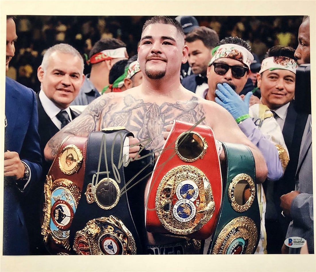 Andy Ruiz Jr Signed 11x14 Photo vs Anthony Joshua Beckett COA: Andy Ruiz Jr Signed 11x14 Photo vs Anthony Joshua Beckett COA This is an authentic 11x14 photograph featuring Andy Ruiz Jr. and Anthony Joshua, personally signed by Ruiz Jr. The photo captures a pivot