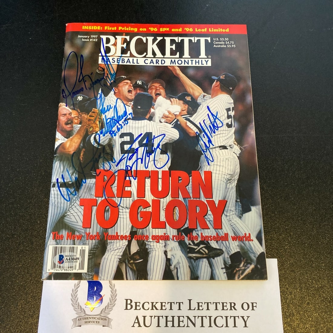 1996 Yankees World Series Champs Team Signed Magazine with Beckett LOA (1 of 8)