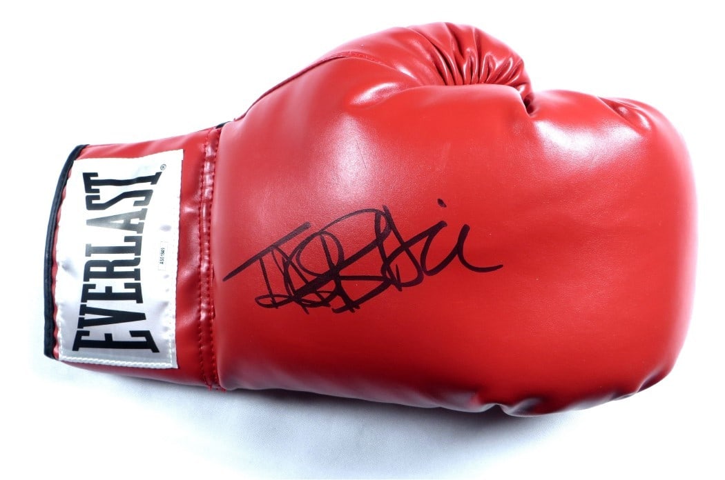 Talia Shire Autographed Boxing Glove Adrian Balboa JSA Certified: Talia Shire Autographed Boxing Glove Adrian Balboa JSA Certified This is an authentic boxing glove signed by Talia Shire, famous for her role as Adrian Balboa in the Rocky film series. The autograph i