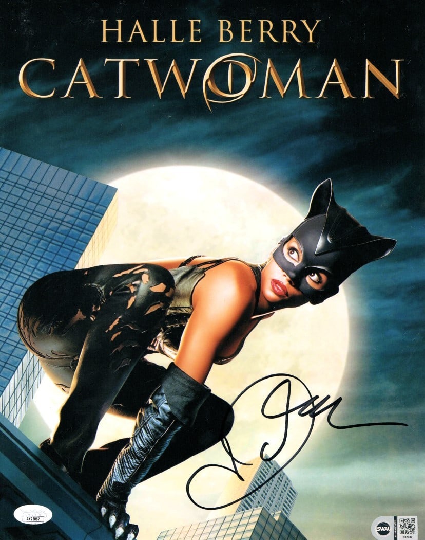 Halle Berry Autographed 11x14 Catwoman Photo JSA Certified: Halle Berry Autographed 11x14 Catwoman Photo JSA Certified This stunning 11X14 photograph features Halle Berry as Catwoman, beautifully signed by the actress herself. Authenticated by James Spence Aut