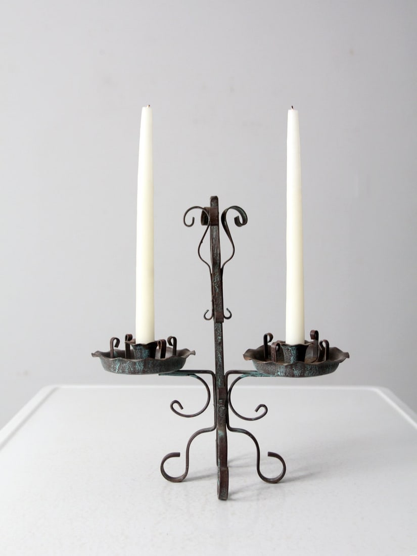 Vintage Wrought Iron Candle Holder with Scroll Design and Patina: Vintage Wrought Iron Candle Holder with Scroll Design and Patina Enhance your space with this vintage wrought iron candle holder, showcasing an elegant scroll work design and two candlestick sconces.