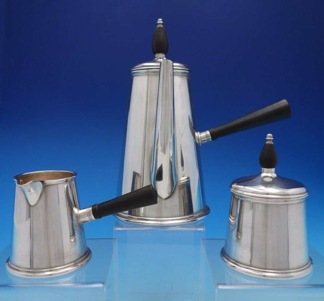 Gump's Queen Anne Silverplate 3 Piece Coffee Set with Ebony Handles: Gump's Queen Anne Silverplate 3 Piece Coffee Set with Ebony Handles Experience elegance with this Queen Anne by Gump's three-piece silverplate coffee set. Featuring exquisite ebony handles and finials
