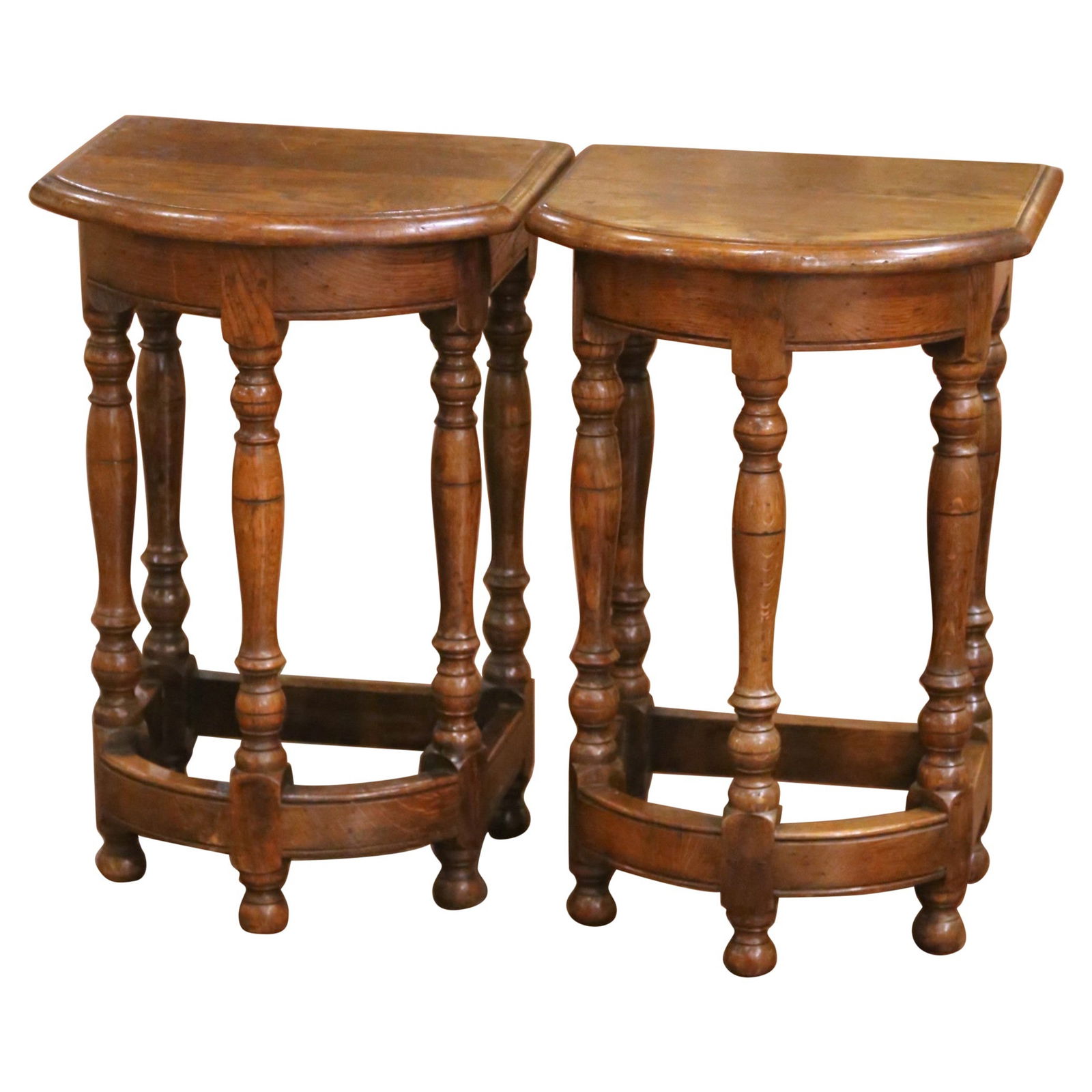 Set of Two French Oak Louis XIII Revival Bow-Front Side Tables Circa 1920: Set of Two French Oak Louis XIII Revival Bow-Front Side Tables Circa 1920 This pair of early 20th-century French Louis XIII revival side tables, crafted around 1920, exemplifies refined craftsmanship